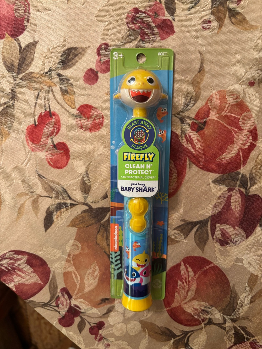 Nickelodeon Baby Shark Toothbrush with Yellow Character Head and Blue Handle